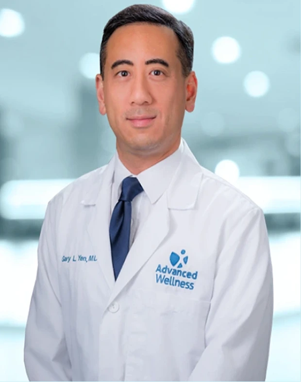 Dr. Sarl L. Yen, MD, in white coat with Advanced Wellness logo against blurred city background