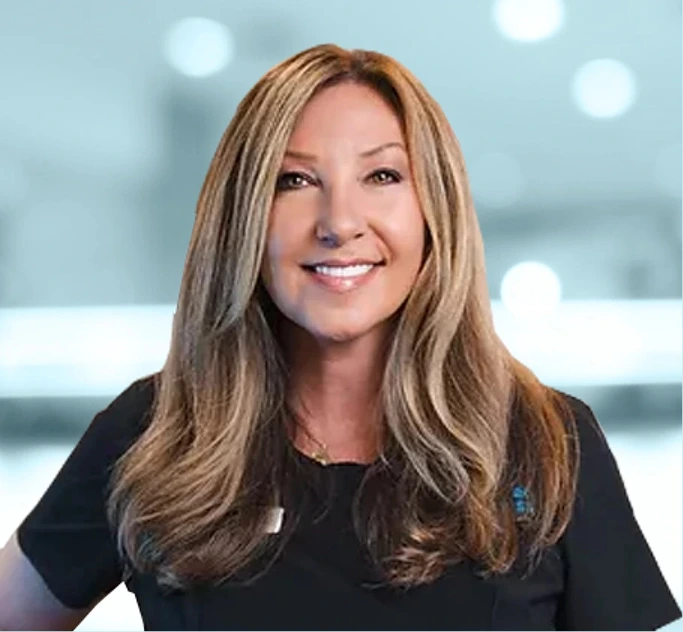 Christine Jinks, woman with long brown hair smiling in black top