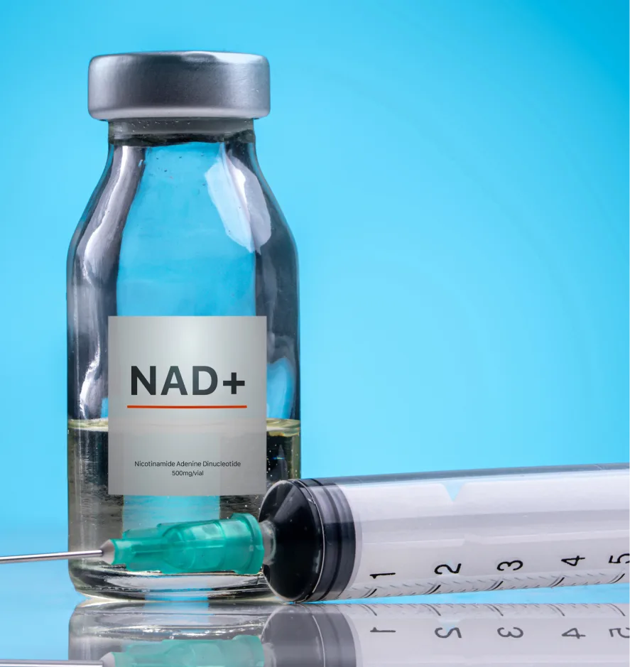 NAD+ vial containing blue liquid with syringe and measurement scale on reflective surface