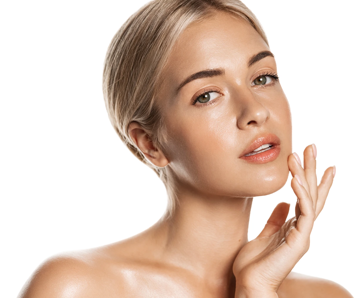 Woman touching her face, demonstrating smooth skin with a neutral background