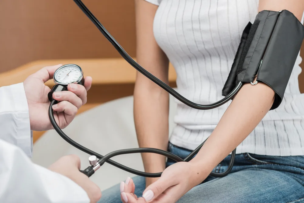 Blood pressure check during a primary care visit