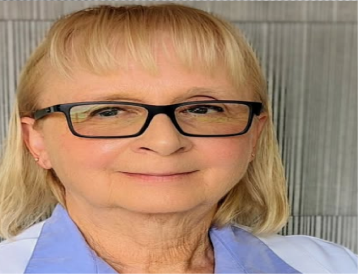 Dr. Cindy, wound care provider, wearing glasses and blue medical coat