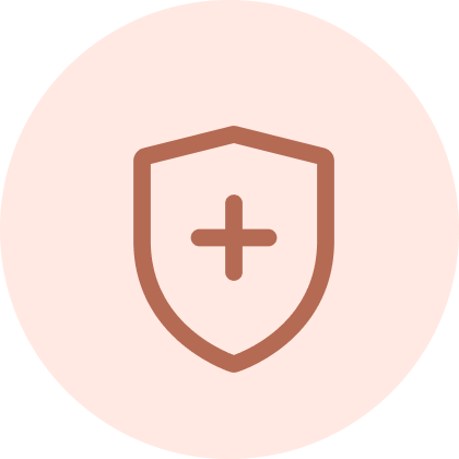 Shield with medical cross symbol on peach circular background