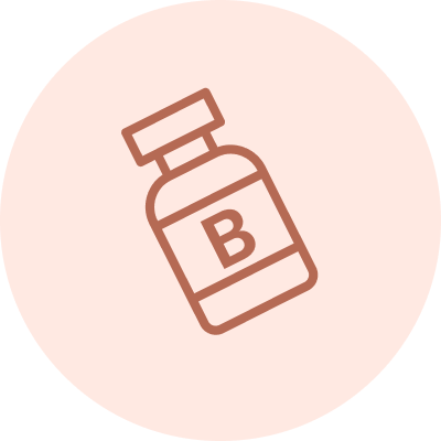 Botox injection vial with letter B on peach circular background