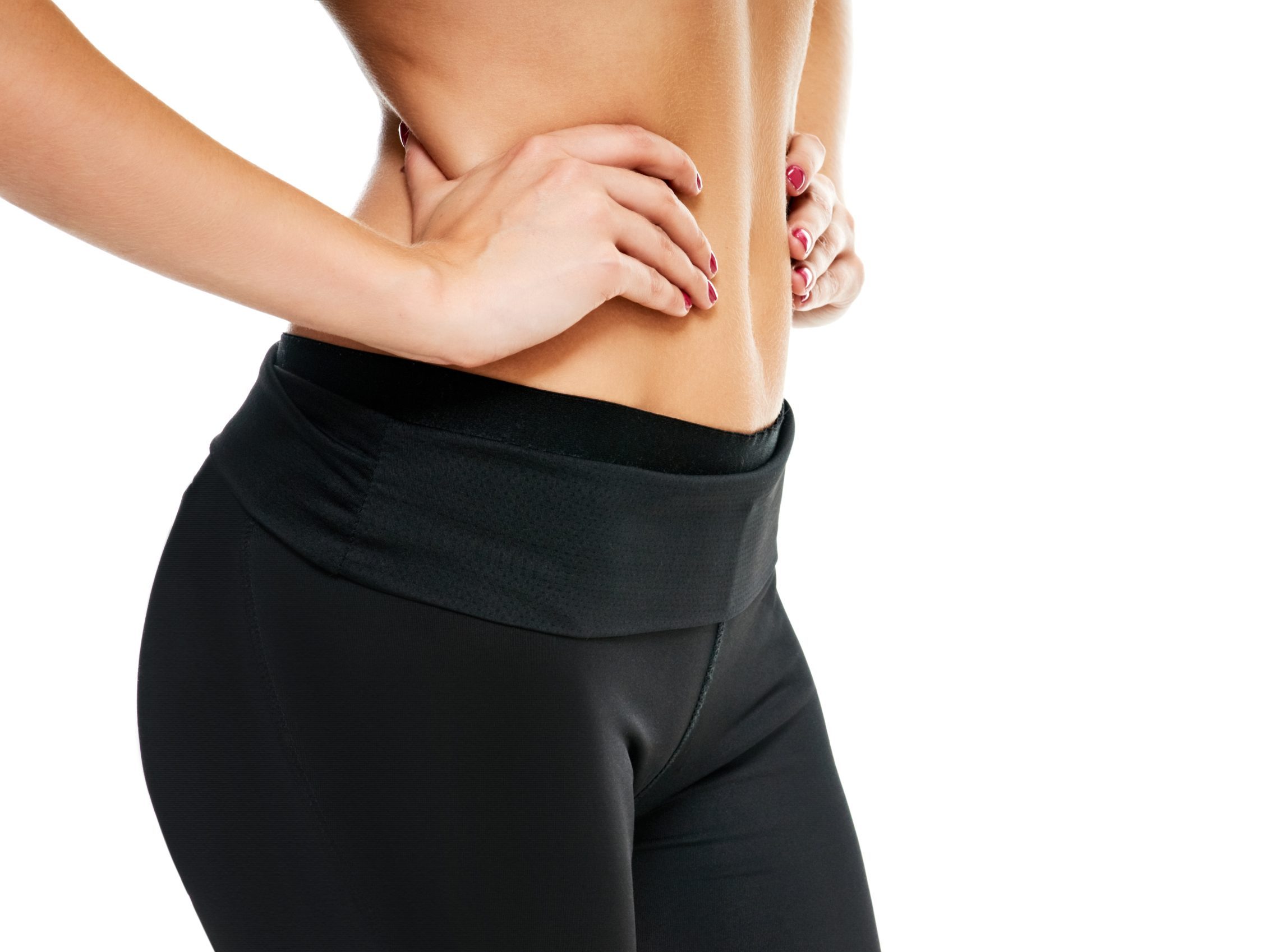 Woman's torso and waist showing contoured body shape against white background