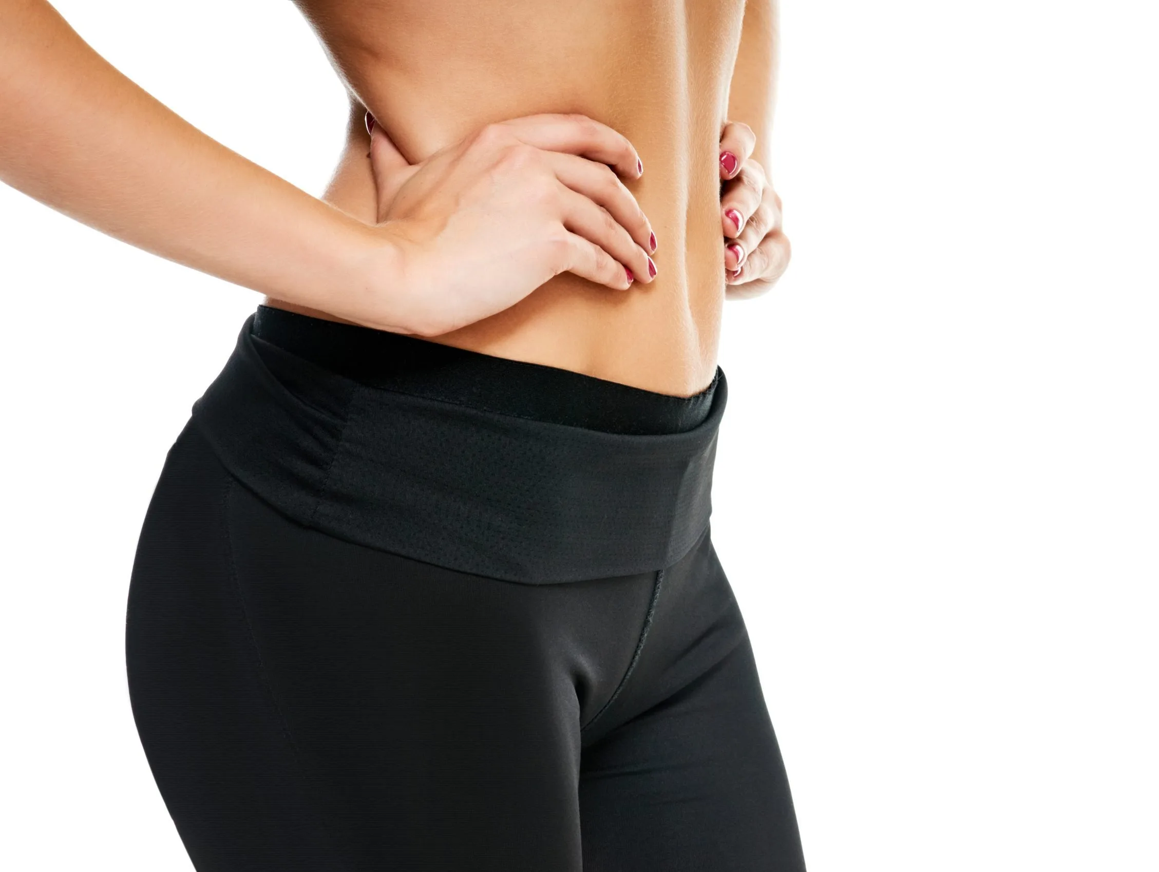 Woman's torso and waist showing contoured body shape against white background
