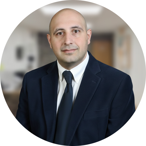 Man in dark suit and tie in a professional portrait