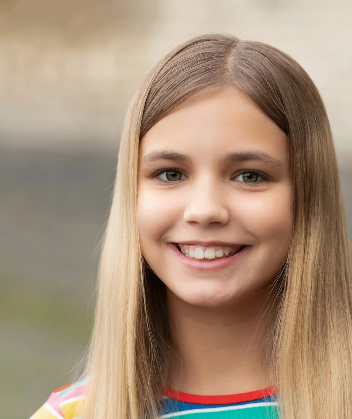 Smiling young girl outdoors