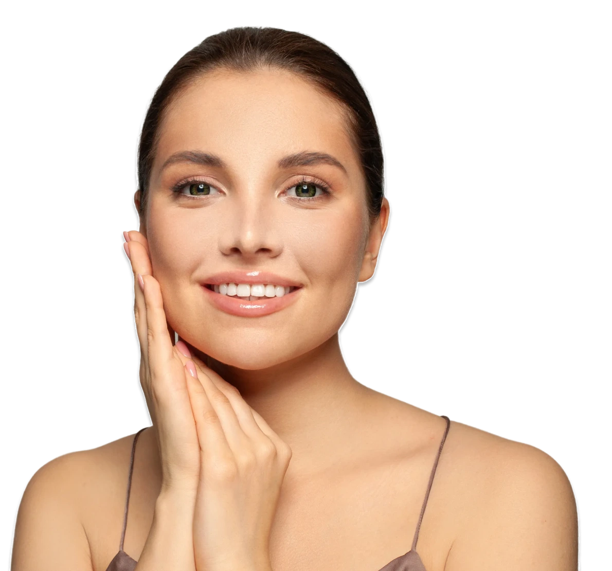 Woman with hands on her face smiling at the camera against a white background