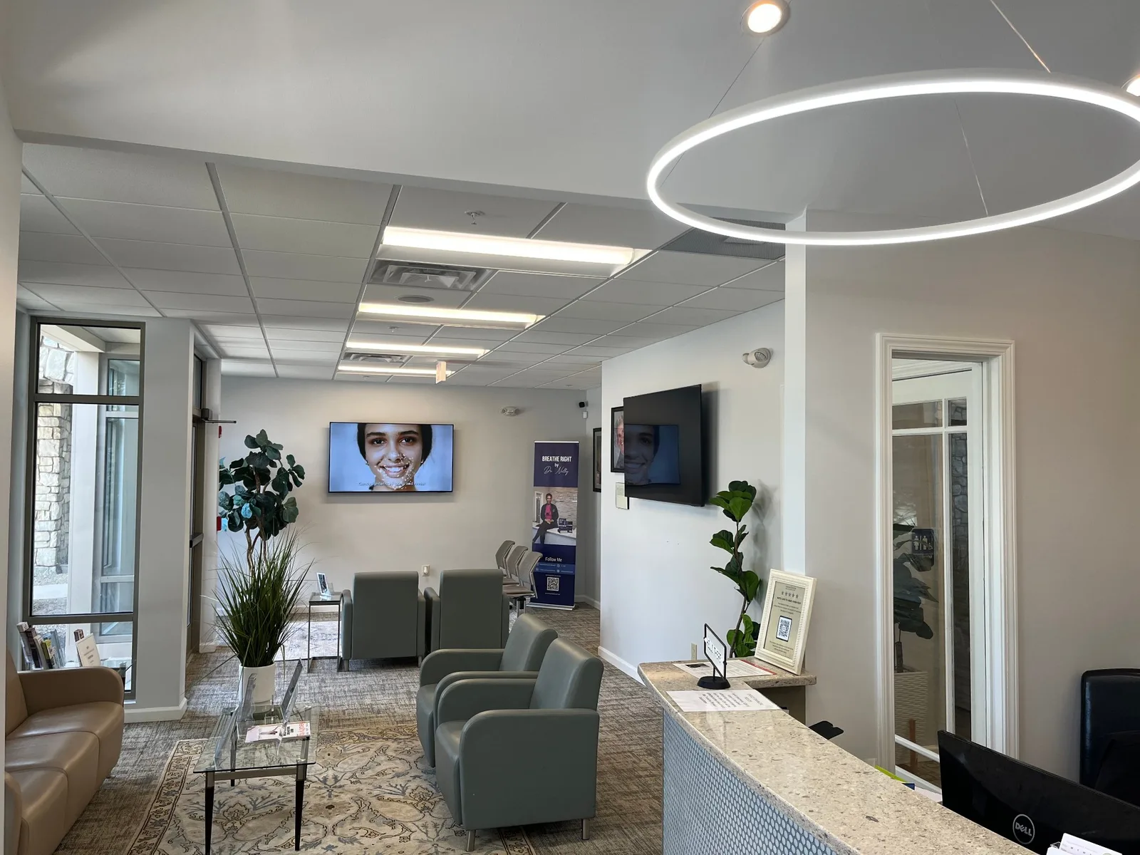 The reception desk and waiting room at Advanced Dentistry of Collegeville