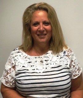 Diane Reilly, team member at Contemporary Care, in striped and lace top