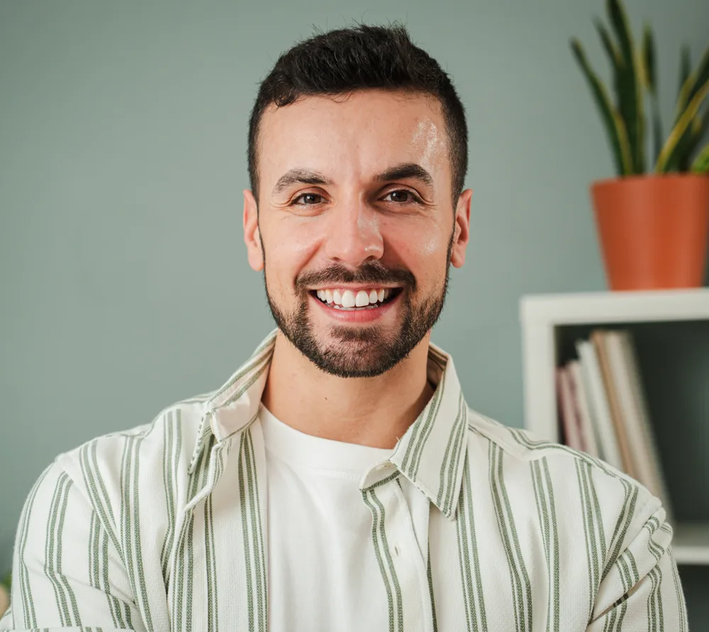 Smiling man in a striped shirt