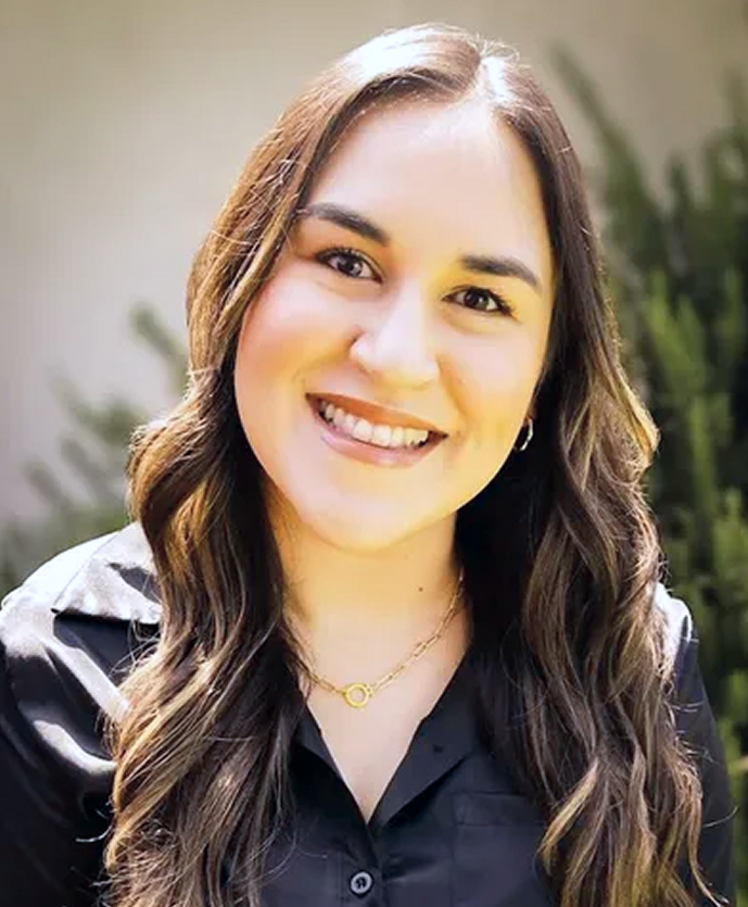 Lindsay, counselor at Daybreak Counseling Center, smiling at camera in professional black shirt