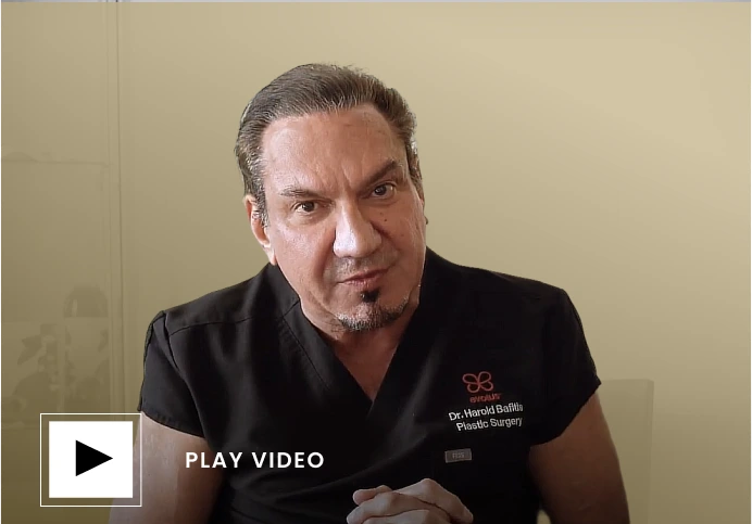 Dr. Harold Bafitis in black surgical attire discussing facelift procedures