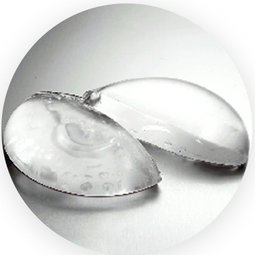 Silicone gel breast implants displayed in cross-section against white background