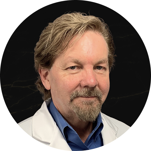 Man in white coat and blue shirt, professional portrait