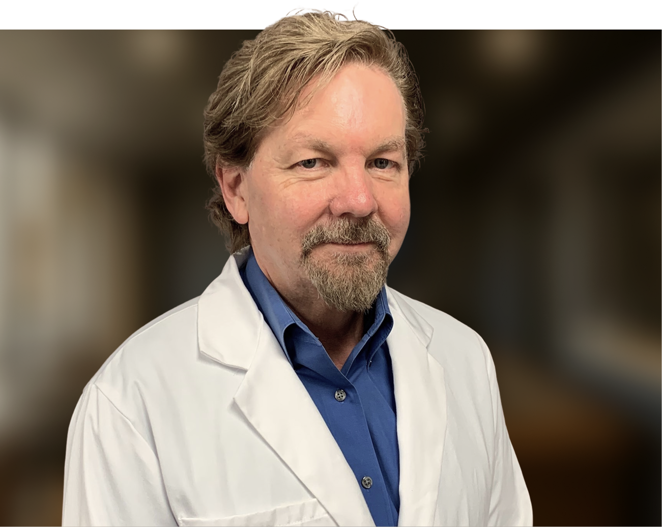 Plastic surgeon in white coat and blue shirt