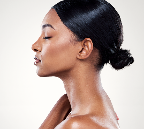 Woman in profile showing nose and facial contour after rhinoplasty
