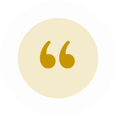 Quotation mark symbol in gold circle