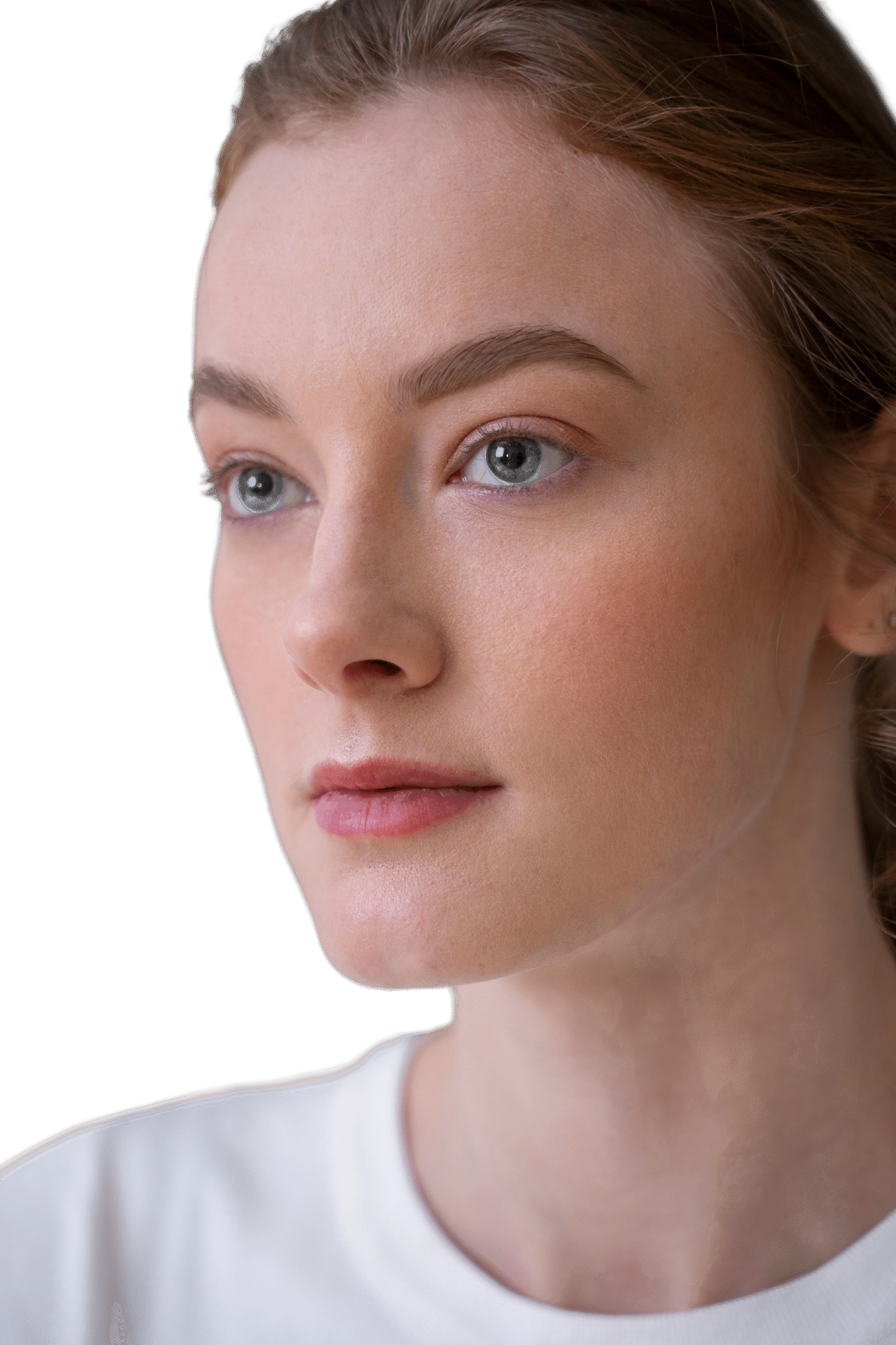 Woman's face in profile showing clear, even skin tone and defined facial features