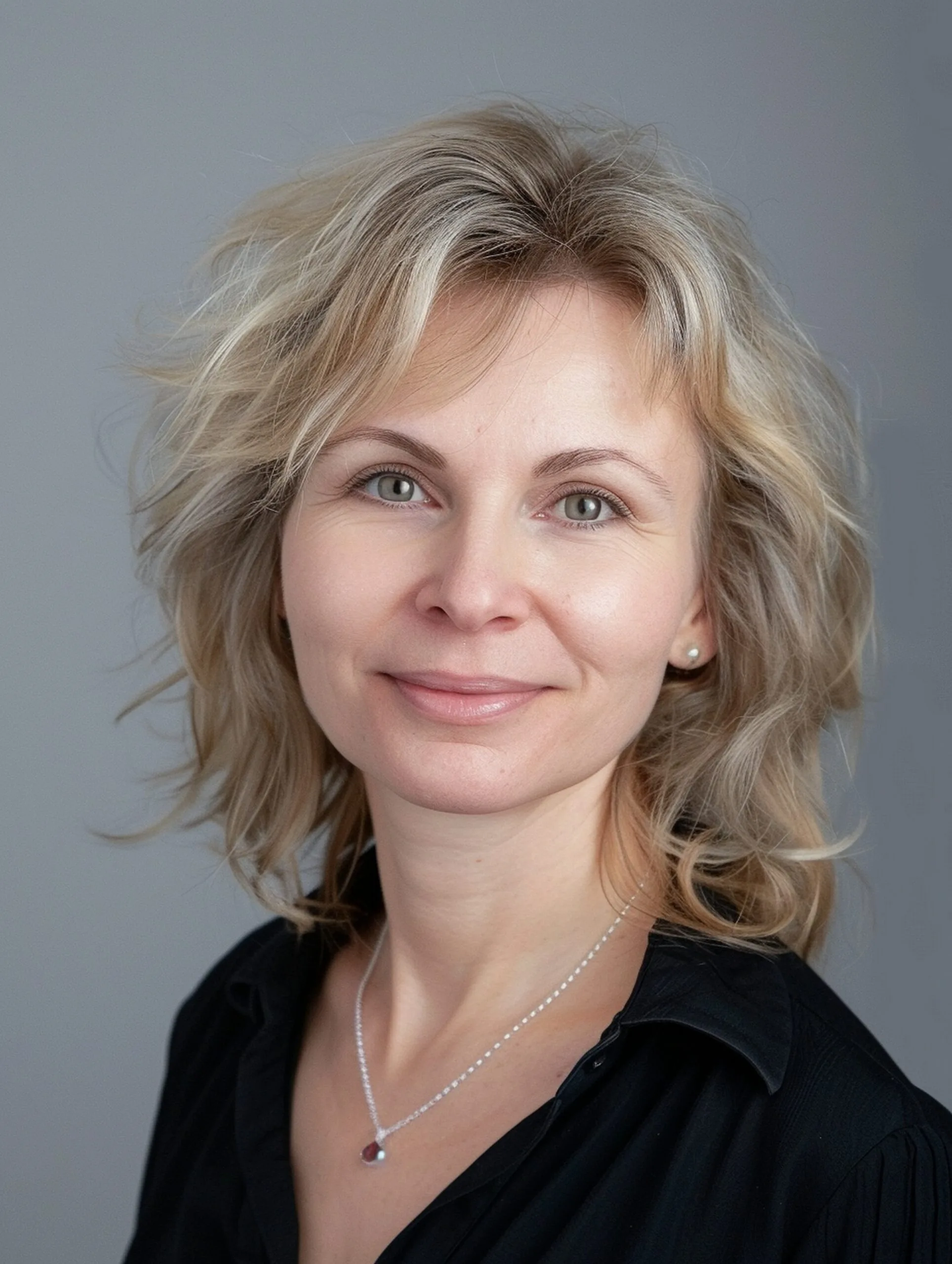 Woman with softened forehead lines and relaxed expression, demonstrating Botox results