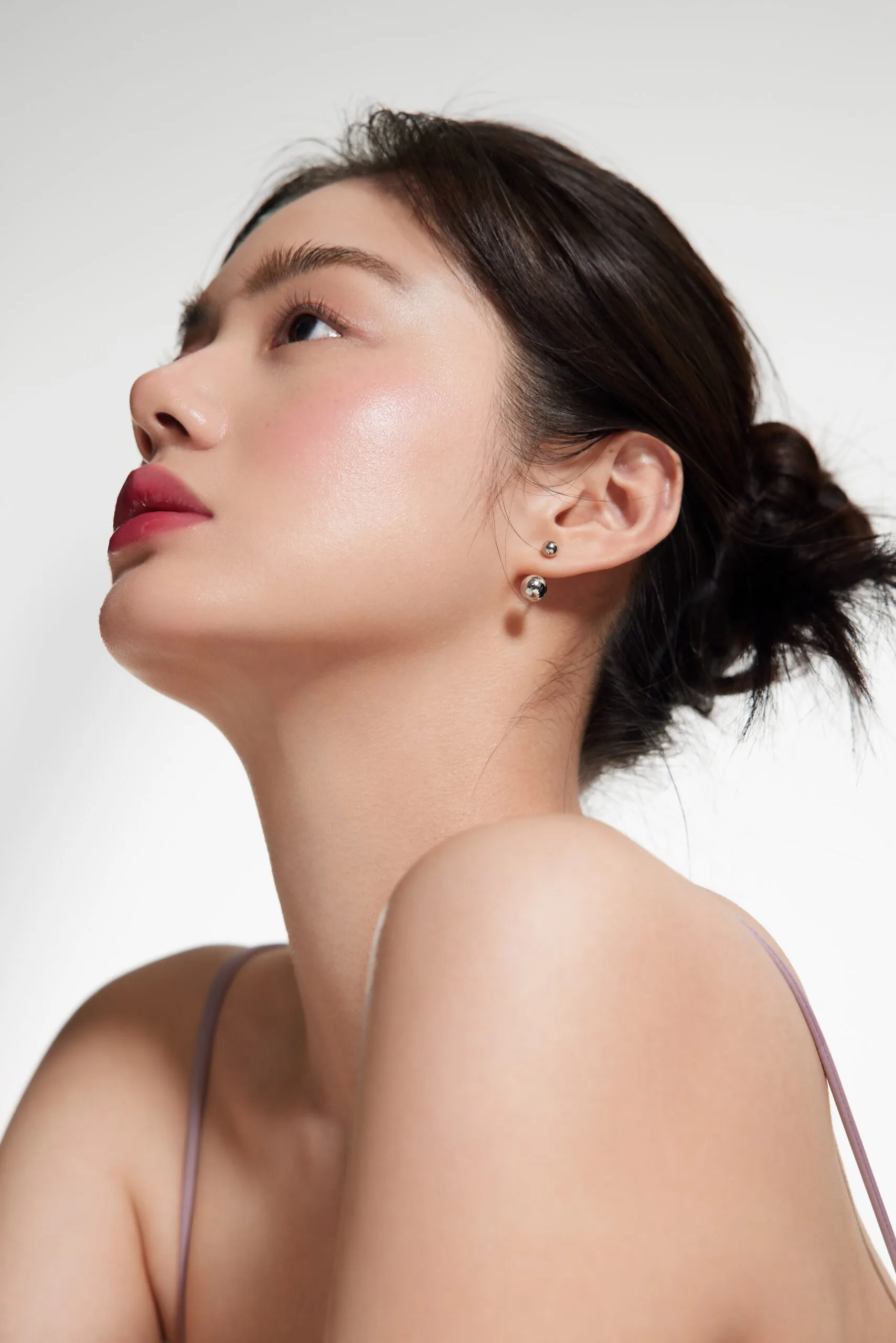 Woman with smooth, radiant complexion showing results after chemical peel treatment
