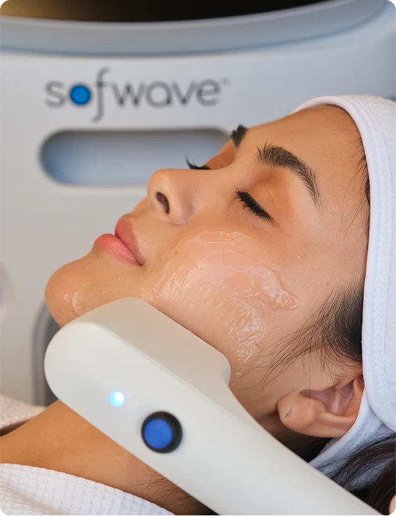 Patient undergoing Softwave acoustic wave therapy on face