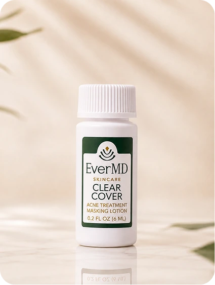 EverMD Skincare Clear Cover acne treatment masking lotion bottle on a neutral surface with plant shadows