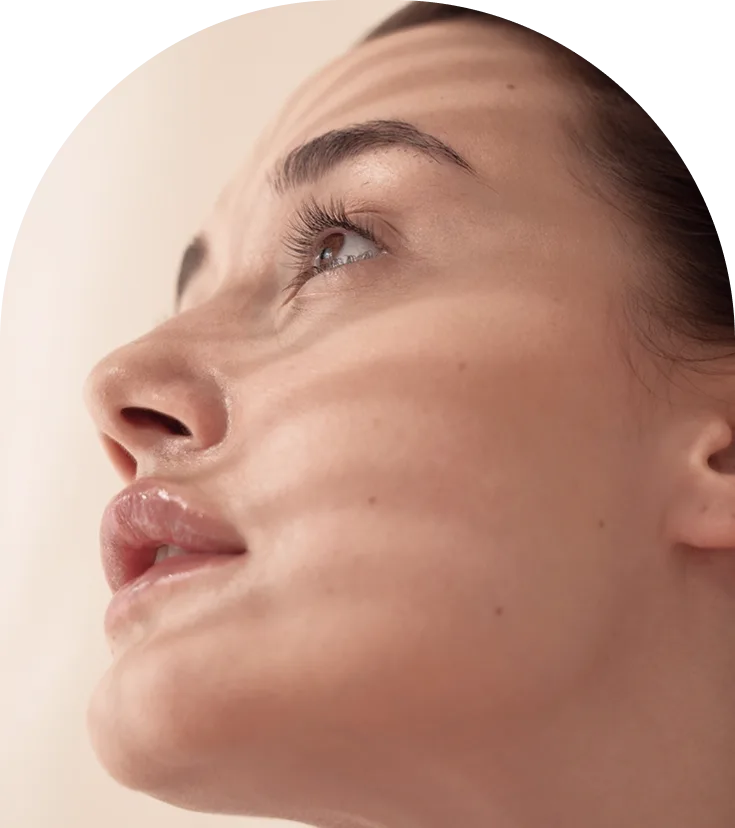 Close-up side profile of woman's face with clear skin