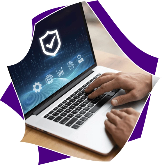 Hand typing on laptop displaying security icons including shield, padlock, and gear symbols