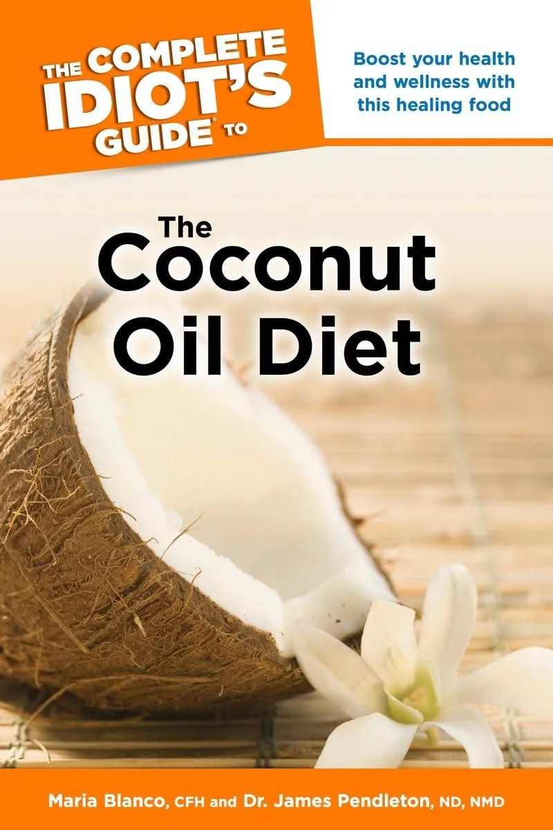 The Complete Idiot's Guide to The Coconut Oil Diet book cover featuring a cracked coconut and white flower on wooden surface