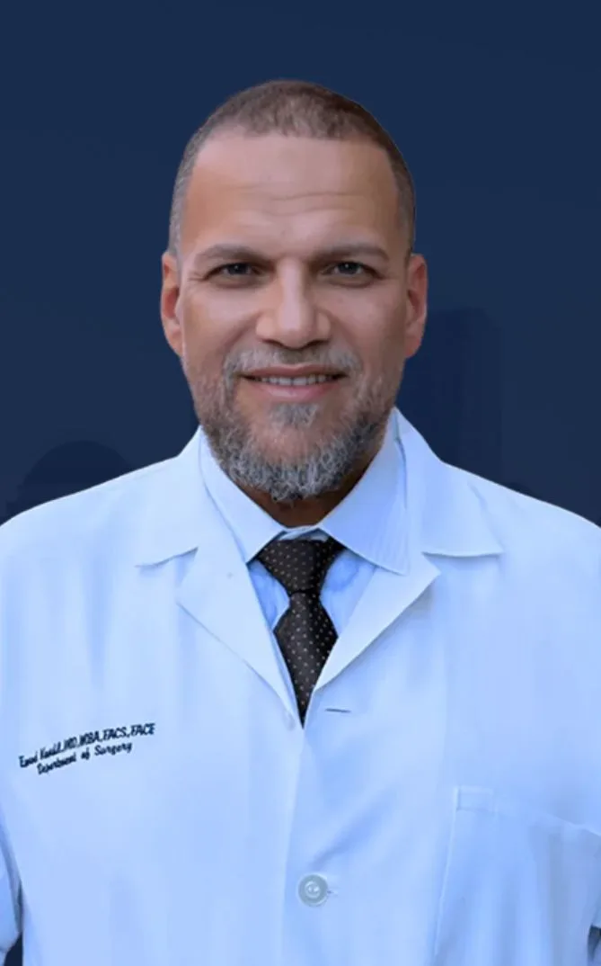 Dr. Jamil Isa, Facial Plastic Surgery, in professional headshot wearing white coat