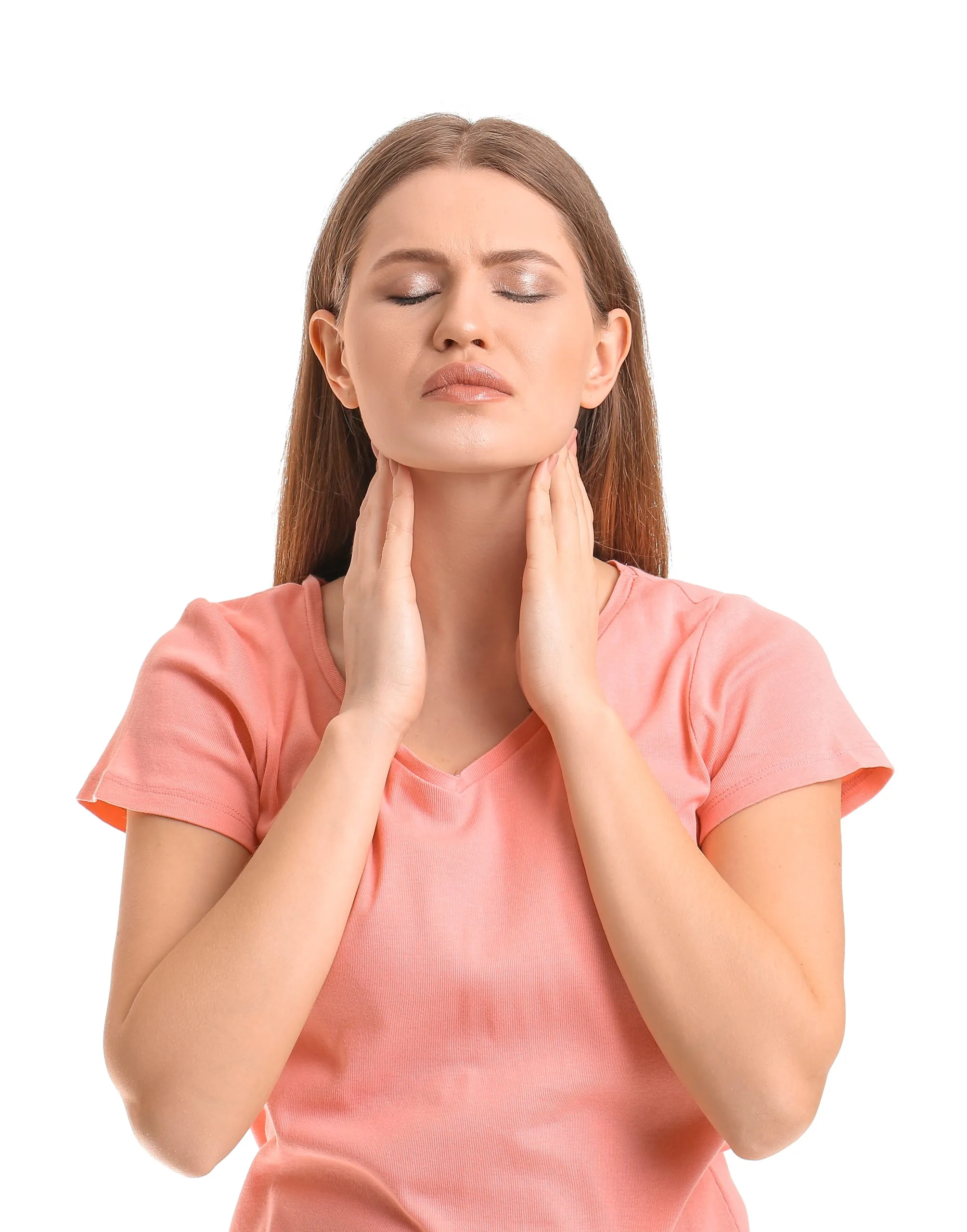 Woman in pink shirt touching her neck, eyes closed, expressing thyroid discomfort