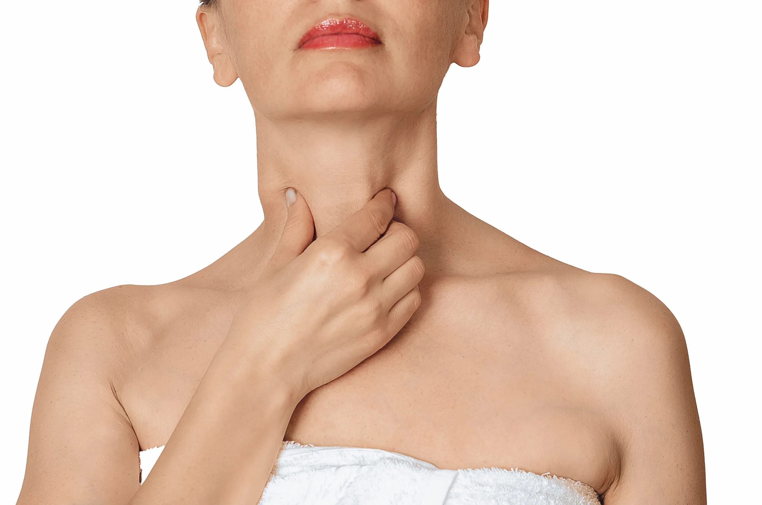 Woman touching her neck and throat, depicting sore throat discomfort