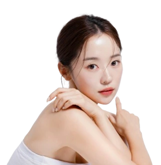 Woman with glowing skin touching her shoulder, showing results of Cell RX facial