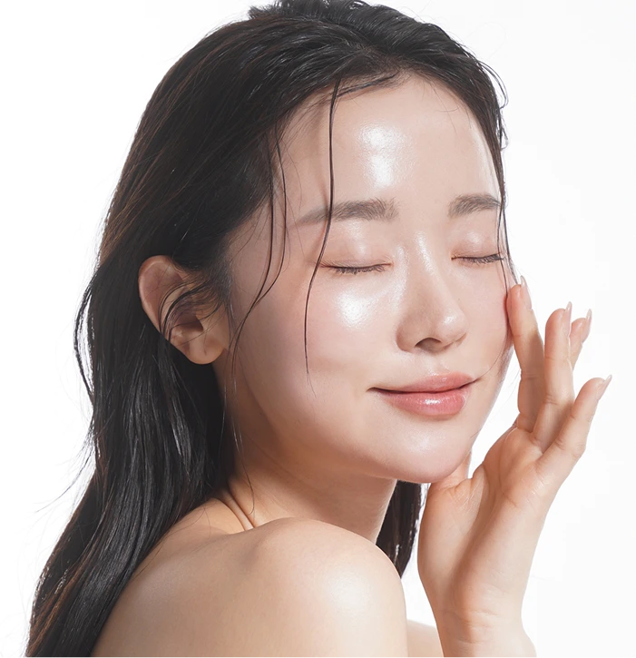 Woman with luminous, refined complexion showing glass skin treatment results