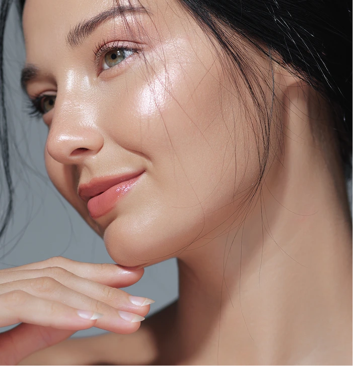 Close-up of woman's glowing skin and defined facial features after Cell RX facial
