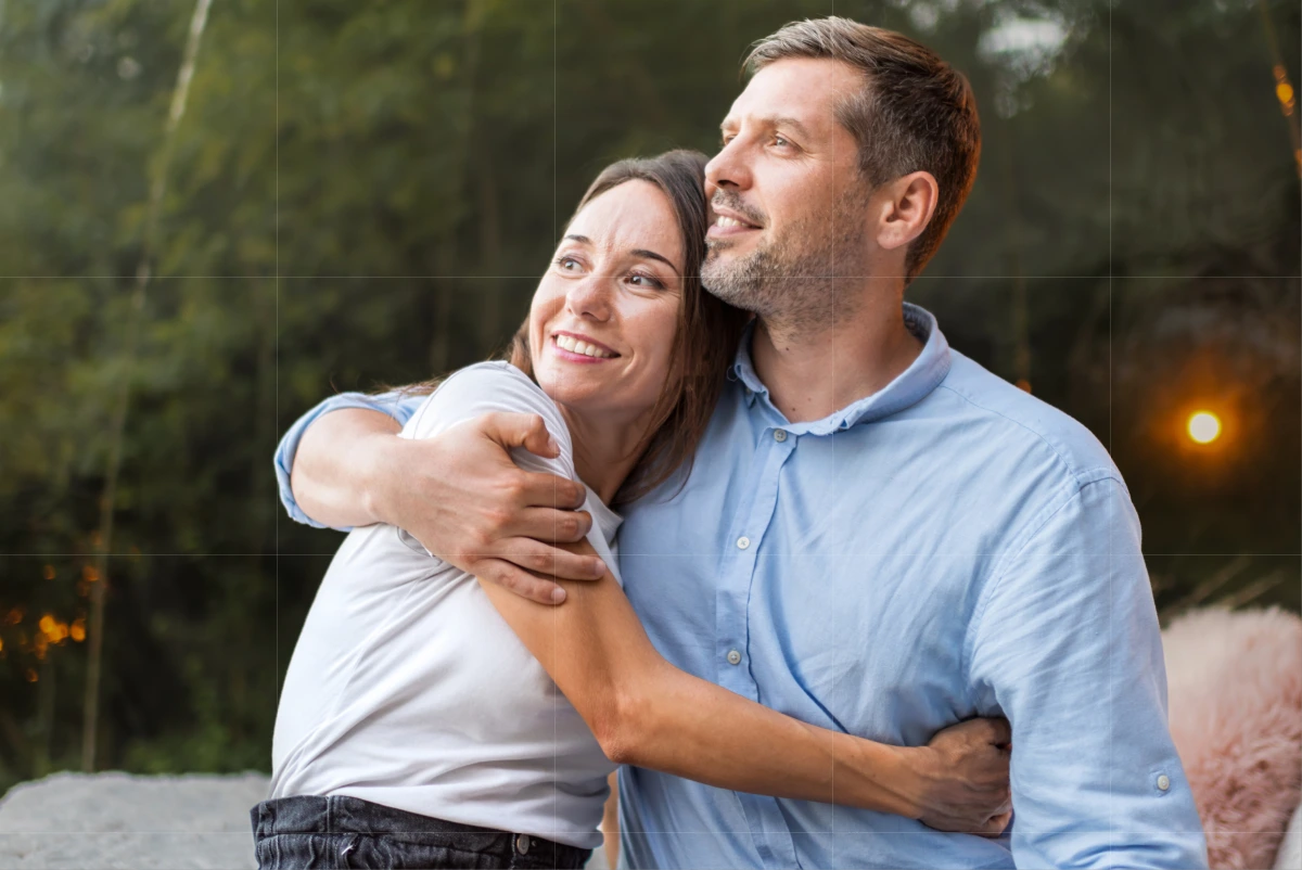 Couple embracing outdoors