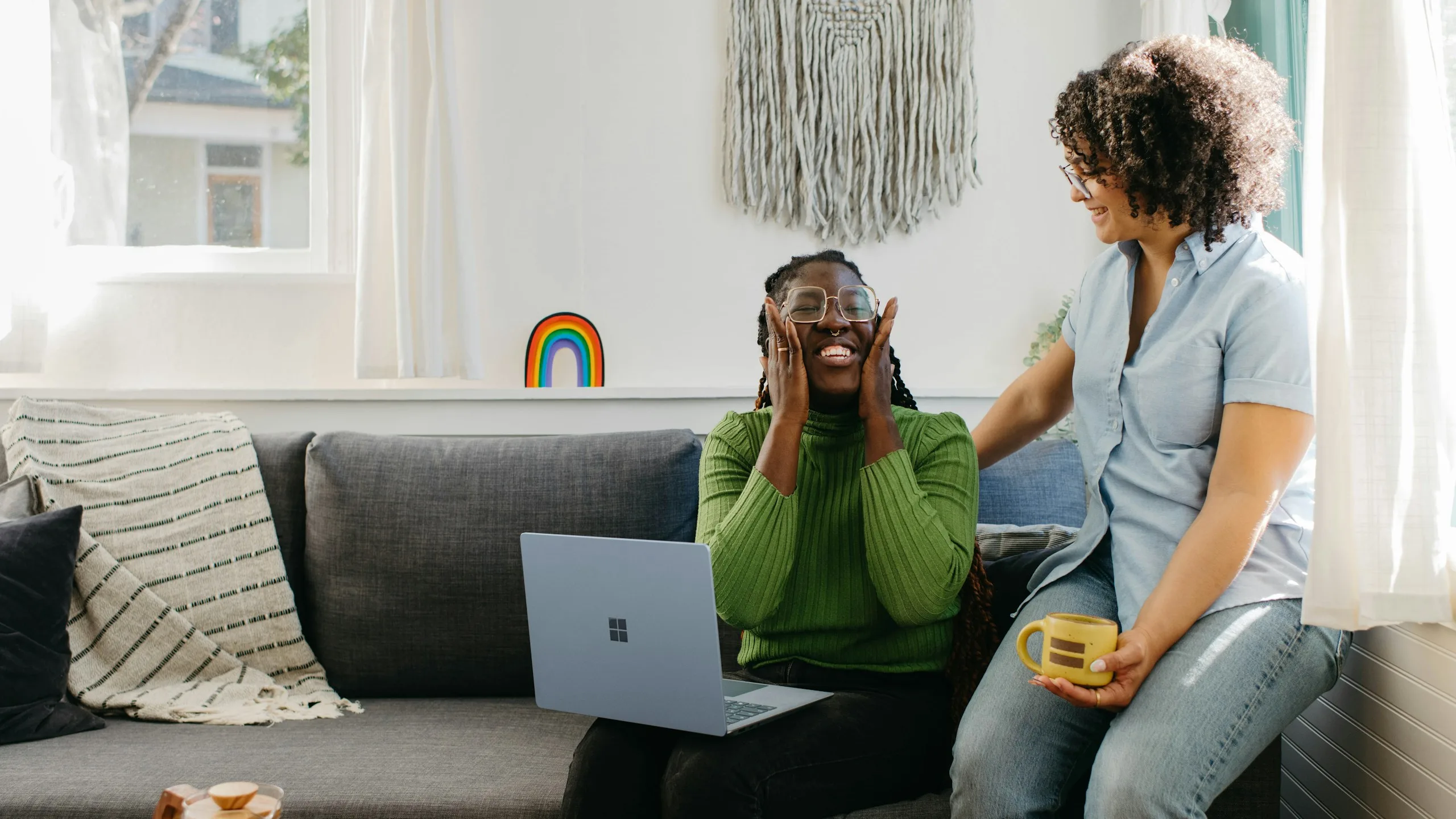 Two people sharing a supportive conversation at home