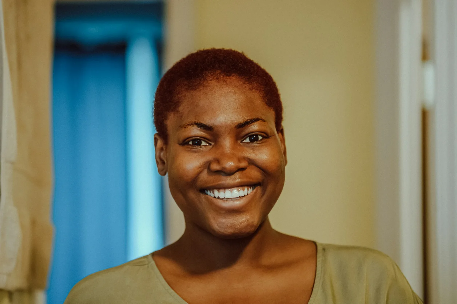 Woman smiling warmly