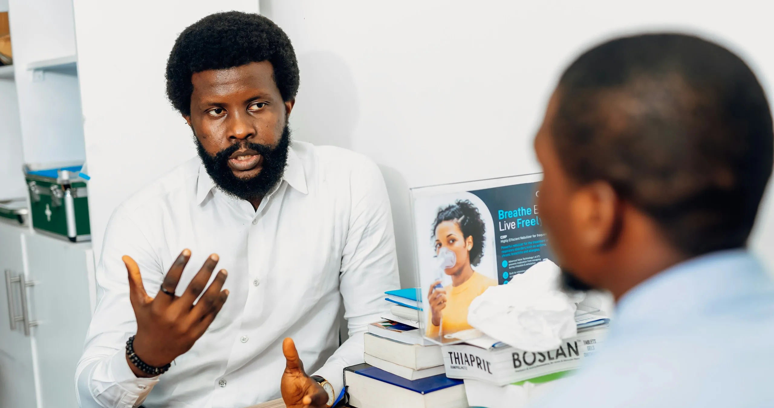 Provider explaining care to a patient