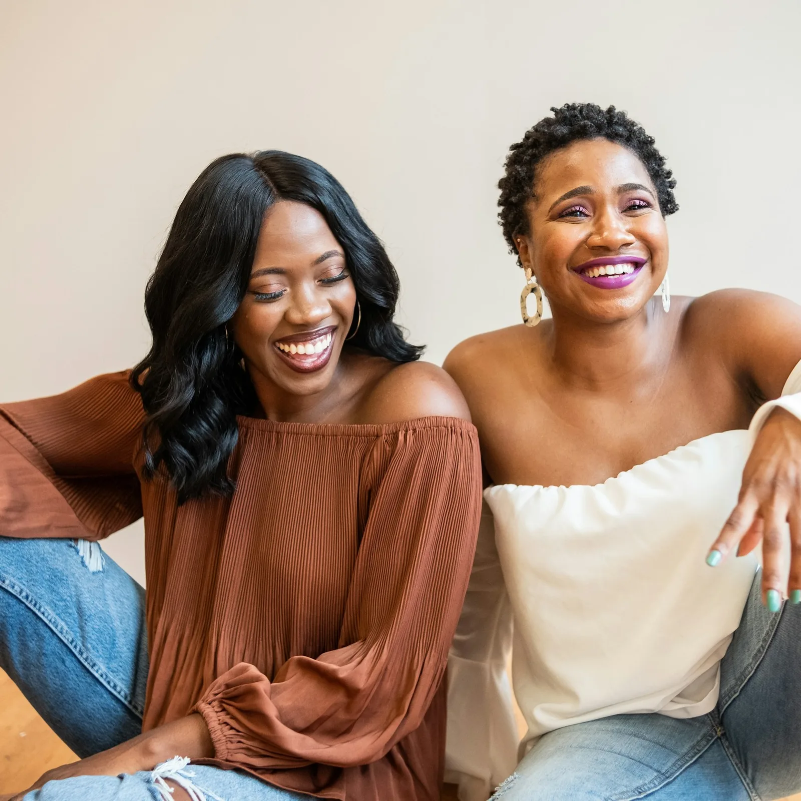 Two women laughing together