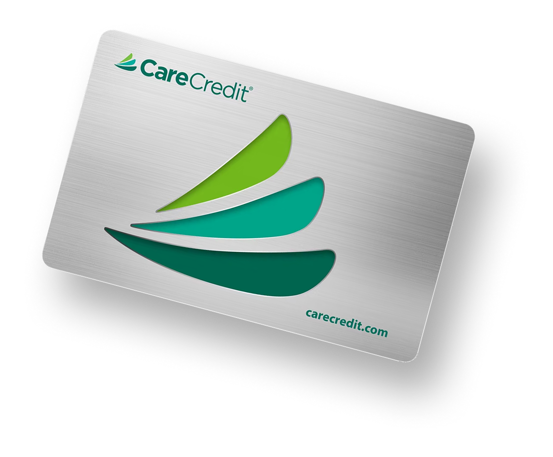 CareCredit payment card with green curved design