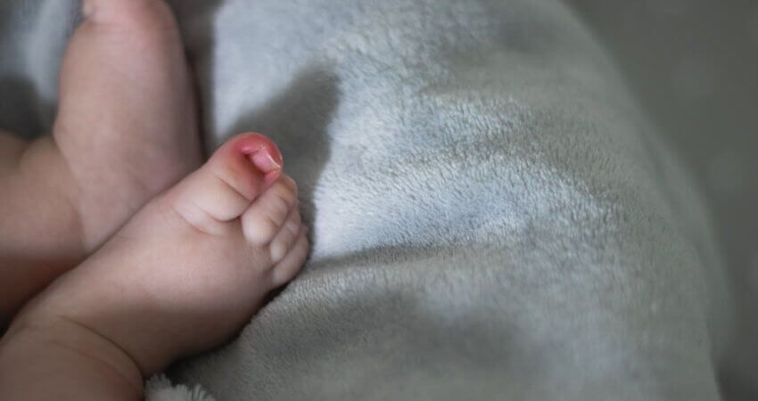 Infant's foot showing redness and inflammation consistent with ingrown toenail