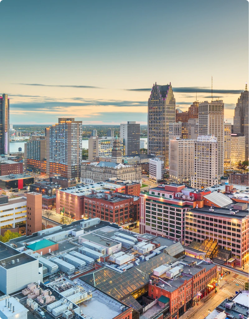 Detroit skyline at sunset with downtown cityscape and waterfront