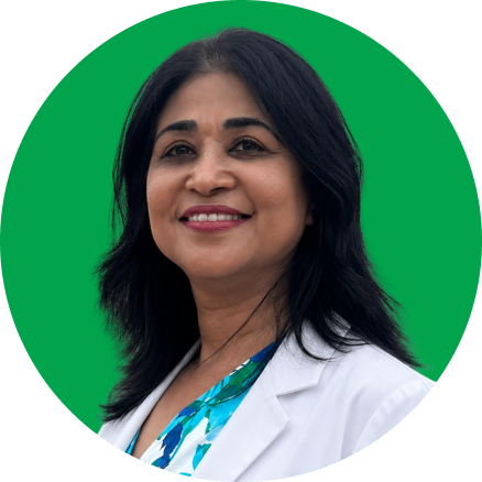 Healthcare professional wearing a white coat and blue patterned stethoscope