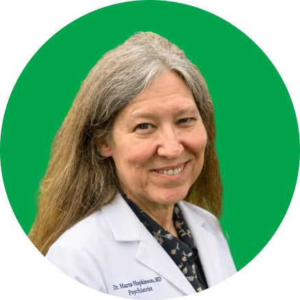 Dr. Maria Hodgkinson, MD, Psychiatrist, wearing white coat with stethoscope