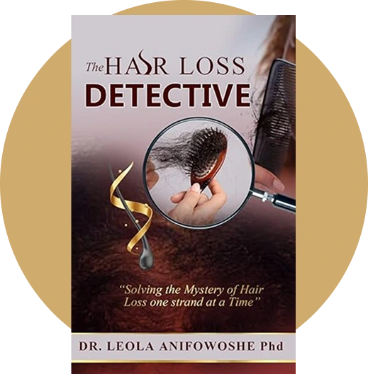 Book cover by Dr. Leola Anifowoshe titled "The Hair Loss Detective: Solving the Mystery of Hair Loss one Strand at a Time" showing magnifying glass examining hair