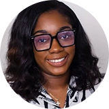 Smiling woman wearing glasses and purple frames