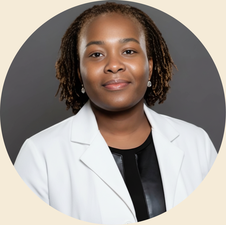 Professional headshot of a doctor in white coat